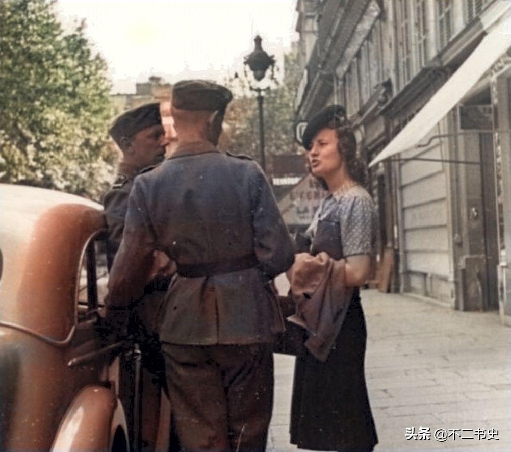 上色老照片：镜头下德占时期的法国，对着德军微笑的巴黎女孩